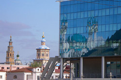 "Reflection of mosque Kul-Sharif in a wall of hotel " Mirage "