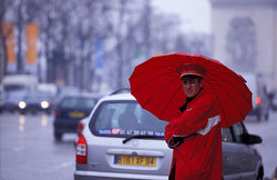 The door-keeper of hotel welcomes visitors