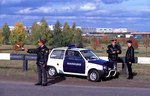 Patrol of a traffic police and the automobile Oka